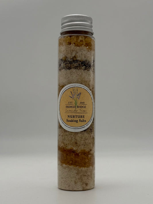 Bottle of Indigo Ridge Lavender Farms Nurture Soaking Salts on a white 
background
