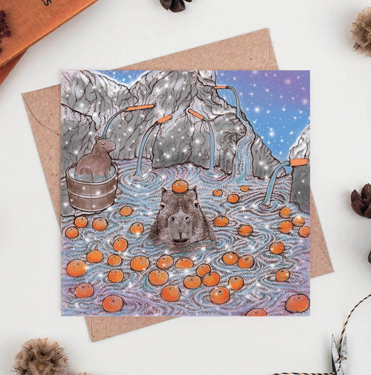 Capybara In A Mandarin Onsen Greeting Card - The Regal Find