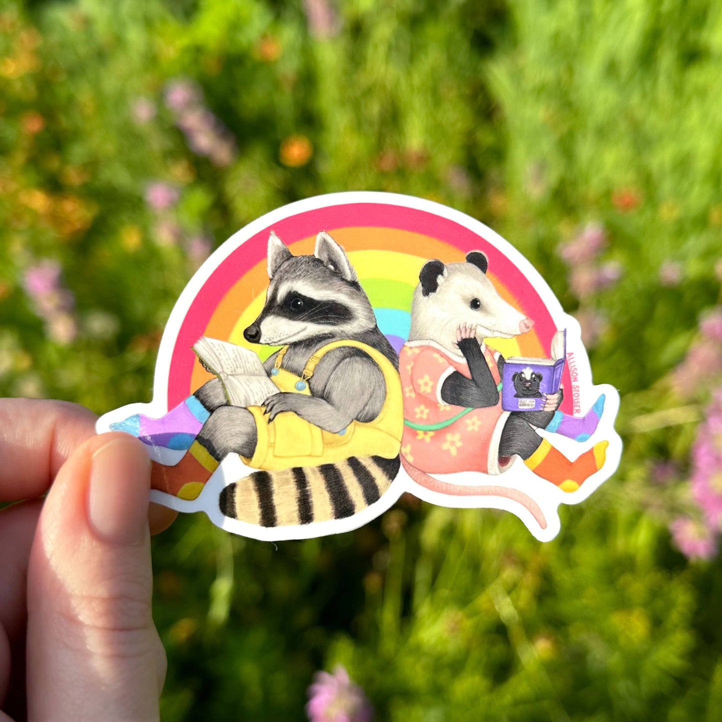 Reading Raccoon and Opossum Rainbow Pride Weatherproof Vinyl Sticker