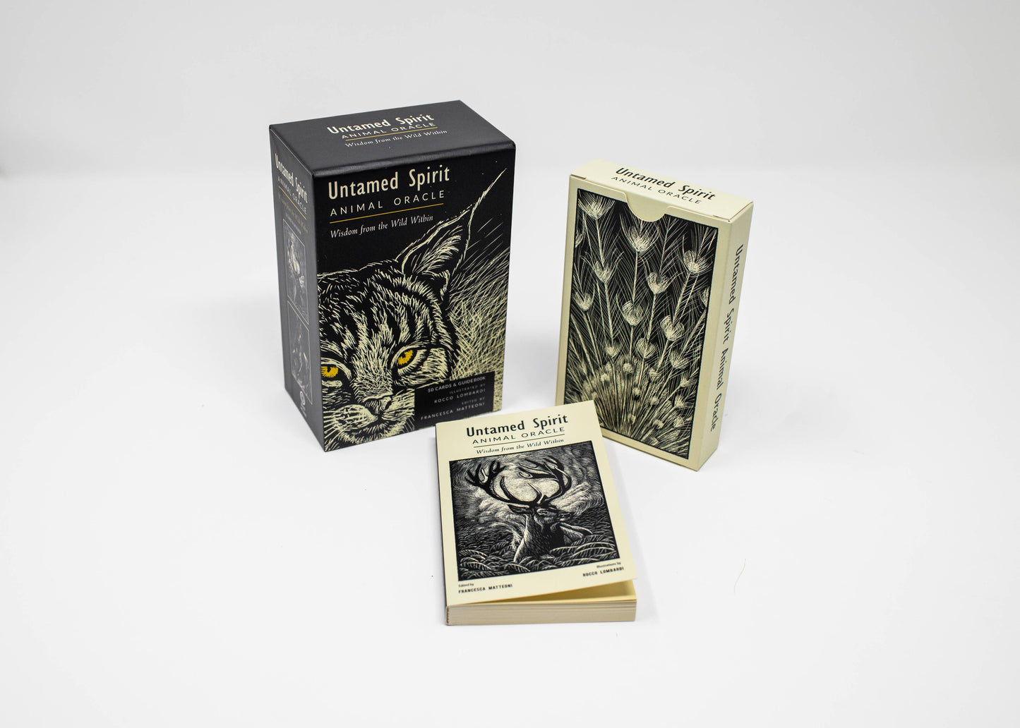 Three 'Untamed Spirit' card decks on a white background