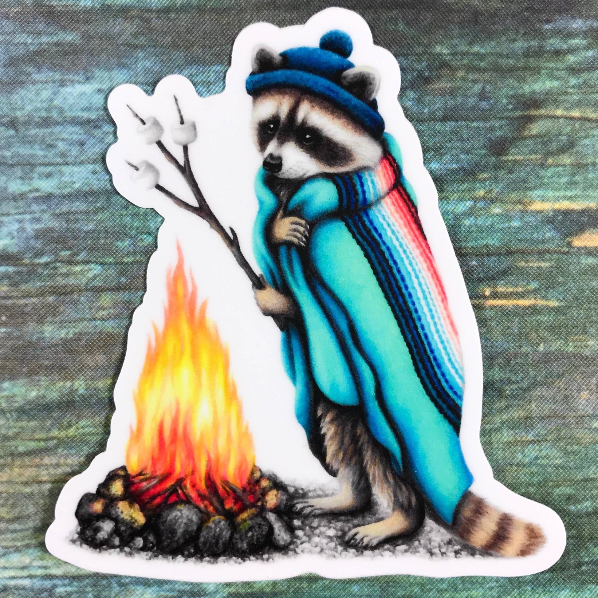 Raccoon roasting marshmallows sticker - The Regal Find