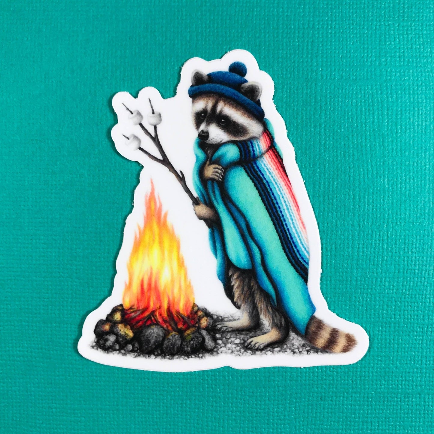 Raccoon roasting marshmallows sticker - The Regal Find